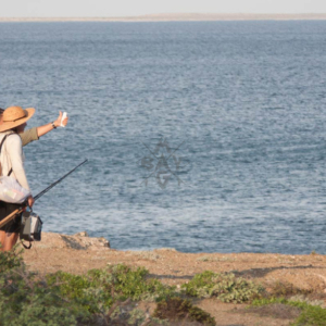 Fisherman looking at waves, Mag Bay Mexico