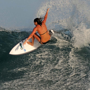 Girl Surfer off the lip, Mag Bay Mexico