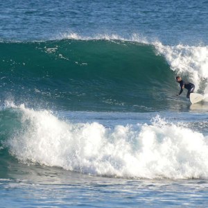 surfer bottom turn, Mag Bay mexico