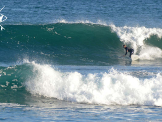 surfer bottom turn, Mag Bay mexico