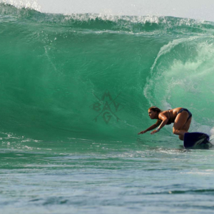 Girl Surfer big wave, Mag Bay Mexico