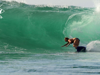 Girl Surfer big wave, Mag Bay Mexico