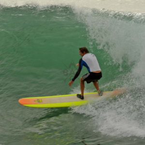 Longboarder on a big wave, Mag Bay Mexico